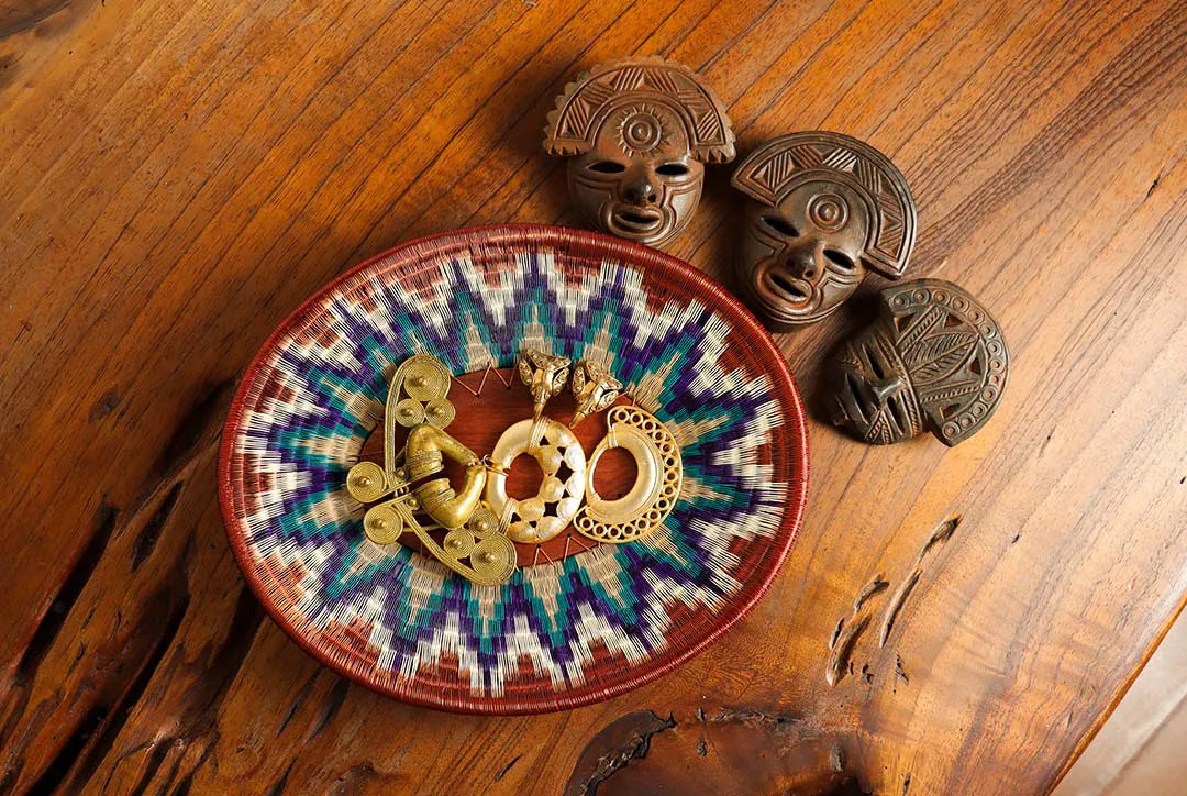 Traditional Colombian Hand crafted elements over a wooden surface.